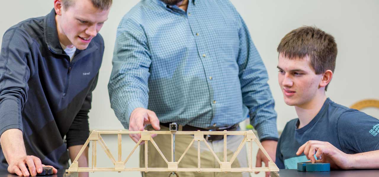 Mechanical Engineering students building a bridge
