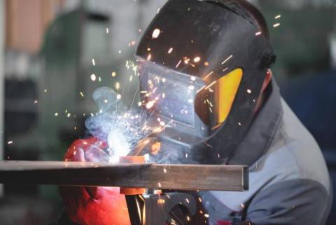 Welding student working on a project