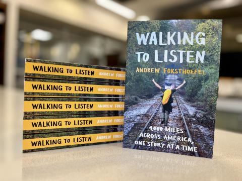 Walking to Listen books propped up on counter